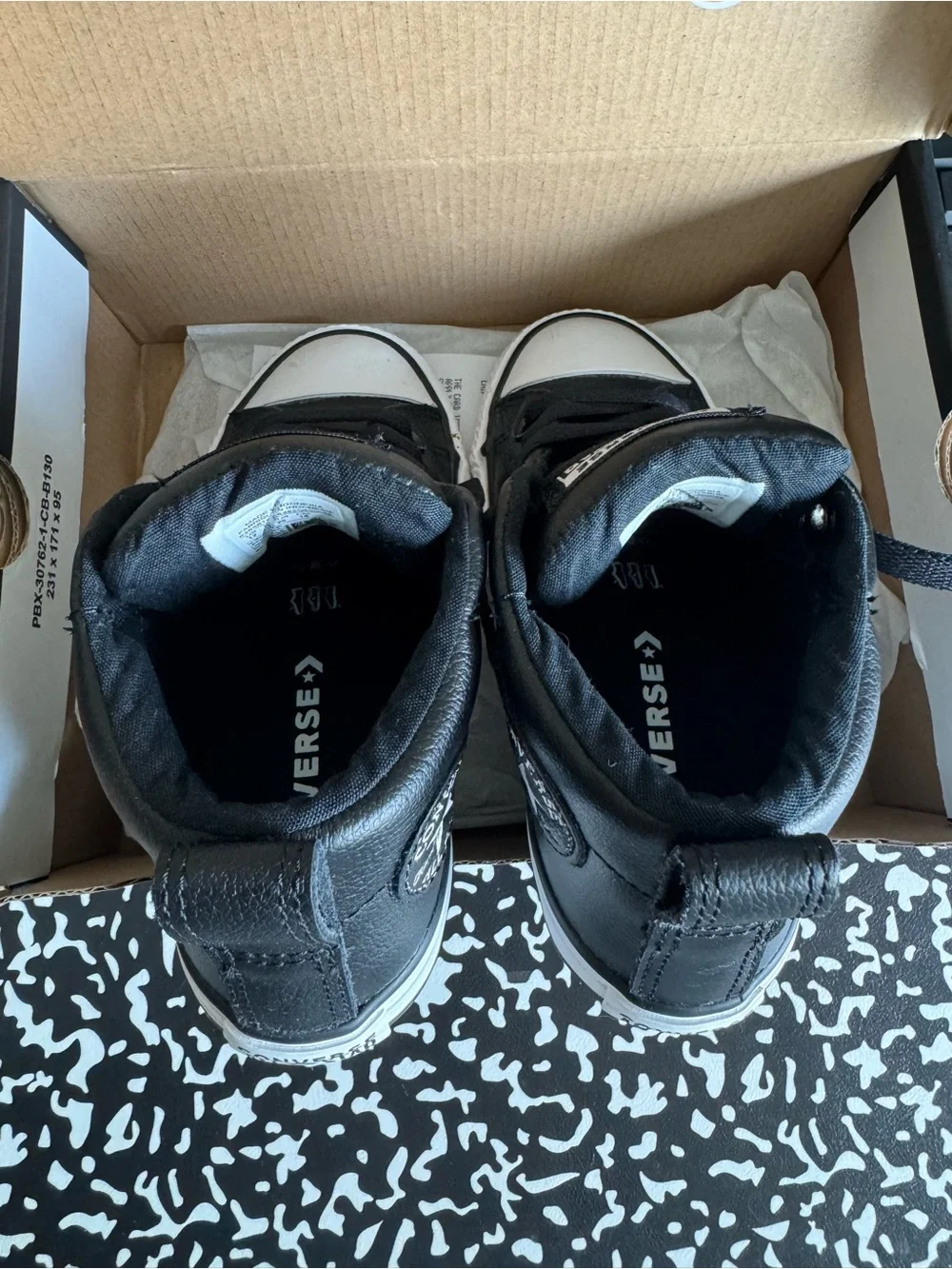 Converse Black and White Leather High Top Sneakers